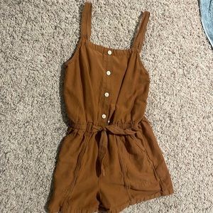 This is a romper and it is brown and from old navy size 10/12